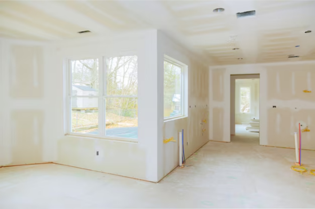 Residential drywall installation during a home renovation.